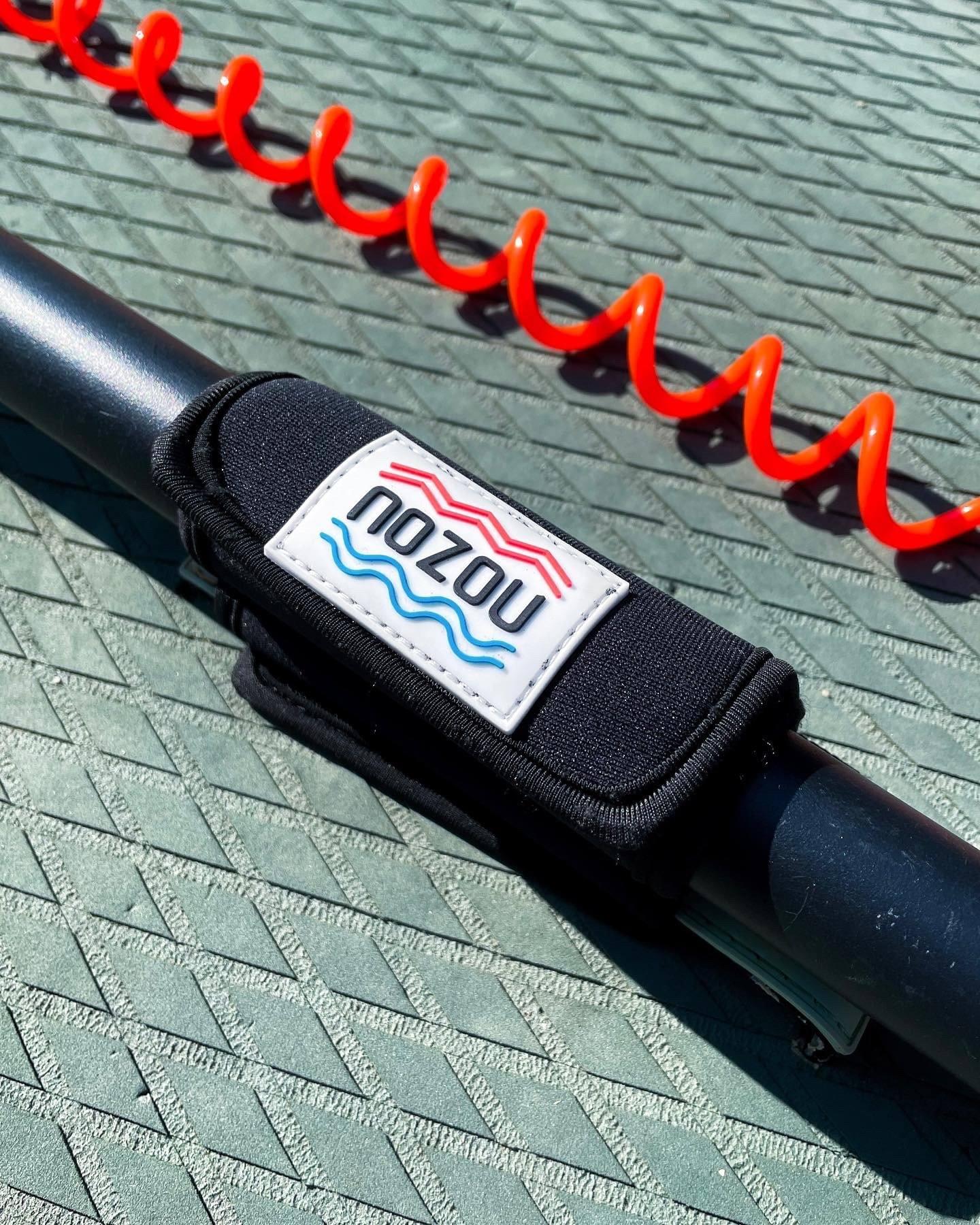 NOZOU Paddle Holder - Non-Slip Grip Fits Securely on Paddle Board Handle